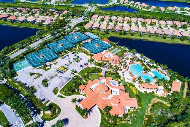 aerial view with a water view and a residential view