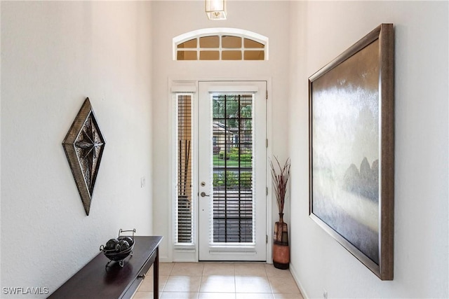 12020 Bramble Cove Dr, Fort Myers, FL 33905 - foyer with baseboards and light tile patterned floors