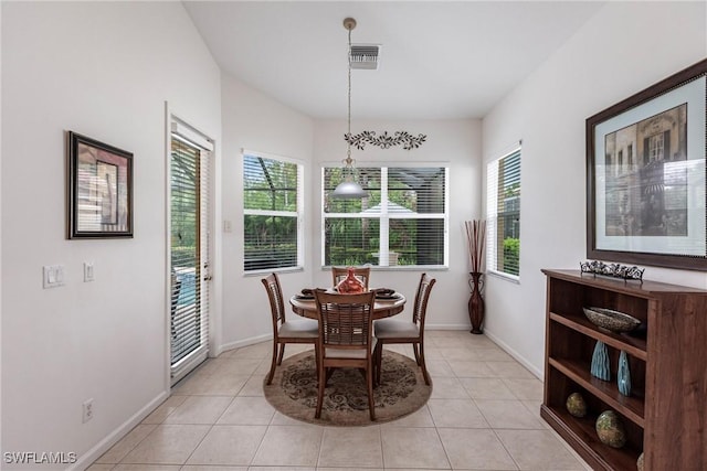 12020 Bramble Cove Dr, Fort Myers, FL 33905 - dining room featuring baseboards, visible vents, and light tile patterned floors