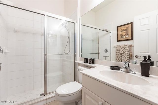 12020 Bramble Cove Dr, Fort Myers, FL 33905 - bathroom featuring a stall shower, toilet, and vanity