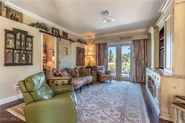 834 Coldstream Ct, Naples, FL 34104 - living room with french doors, crown molding, a barn door, dark wood-type flooring, and baseboards