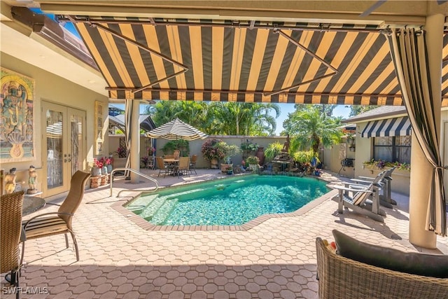 834 Coldstream Ct, Naples, FL 34104 - view of pool with french doors, a patio, and a fenced backyard