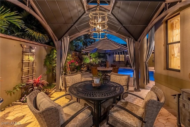 834 Coldstream Ct, Naples, FL 34104 - view of patio / terrace featuring an outdoor pool