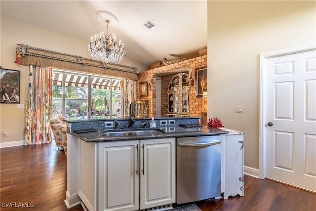 834 Coldstream Ct, Naples, FL 34104 - kitchen featuring stainless steel dishwasher, a sink, dark wood-type flooring, baseboards, and lofted ceiling