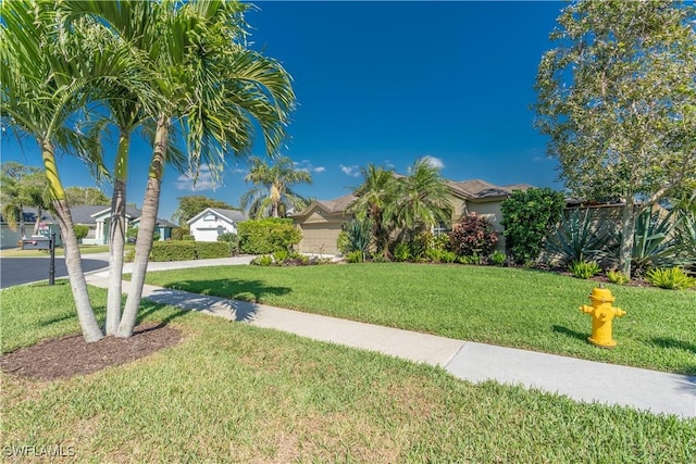 834 Coldstream Ct, Naples, FL 34104 - view of grassy yard with a residential view