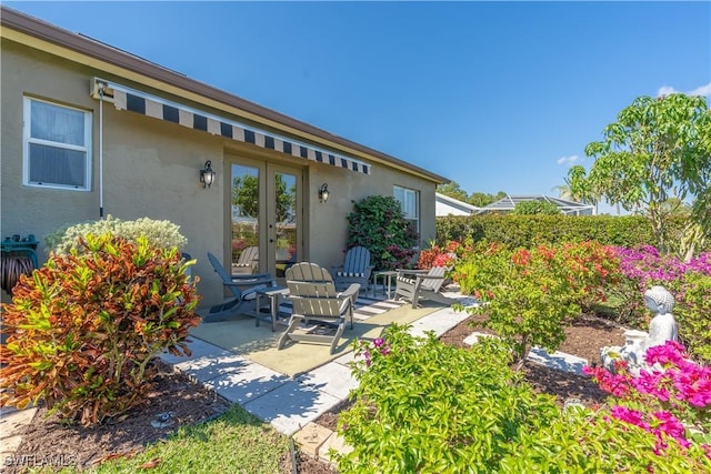 834 Coldstream Ct, Naples, FL 34104 - view of patio / terrace with french doors