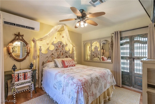 834 Coldstream Ct, Naples, FL 34104 - bedroom with a wall mounted AC, access to outside, french doors, wood finished floors, and a ceiling fan