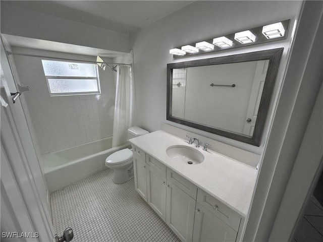 bathroom with shower / tub combo, vanity, toilet, and tile patterned floors