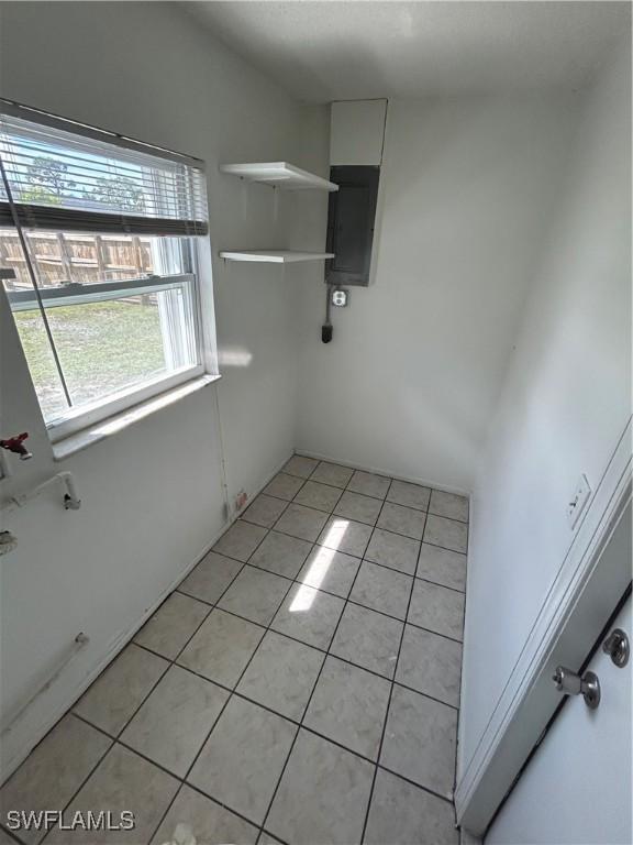 empty room with light tile patterned floors