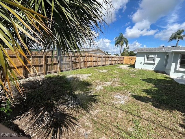 view of yard featuring a fenced backyard