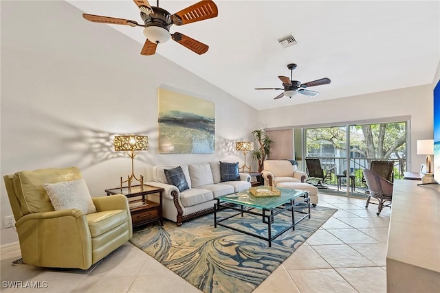 living room featuring visible vents, vaulted ceiling, a ceiling fan, and light tile patterned flooring