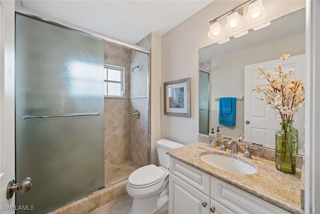 7070 Barrington Cir Unit 202, Naples, FL 34108 - full bath featuring toilet, a stall shower, vanity, and tile patterned flooring