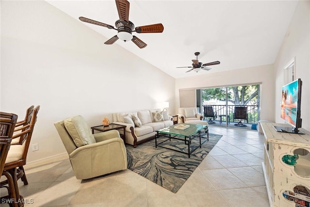 7070 Barrington Cir Unit 202, Naples, FL 34108 - living room featuring a ceiling fan, high vaulted ceiling, and light tile patterned floors