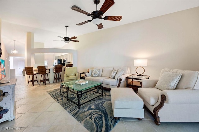 7070 Barrington Cir Unit 202, Naples, FL 34108 - living room with a ceiling fan and light tile patterned floors