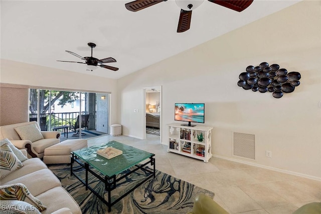 7070 Barrington Cir Unit 202, Naples, FL 34108 - tiled living room with ceiling fan, baseboards, and lofted ceiling