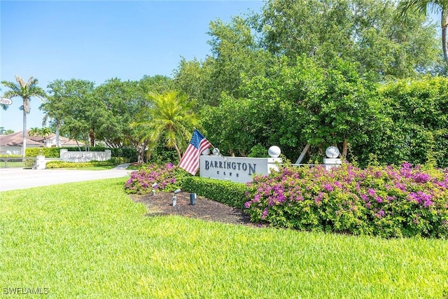 7070 Barrington Cir Unit 202, Naples, FL 34108 - community sign with a yard