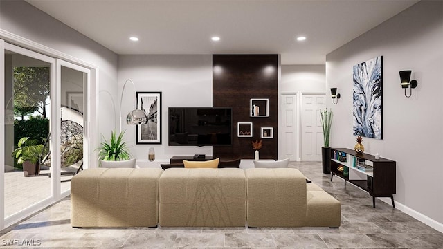 living room featuring recessed lighting and baseboards