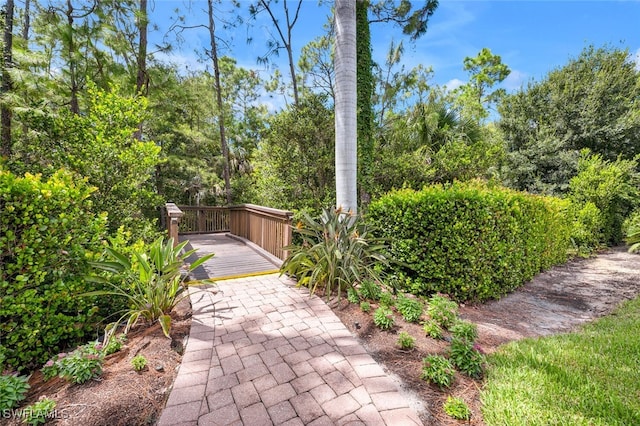 view of yard with a wooden deck