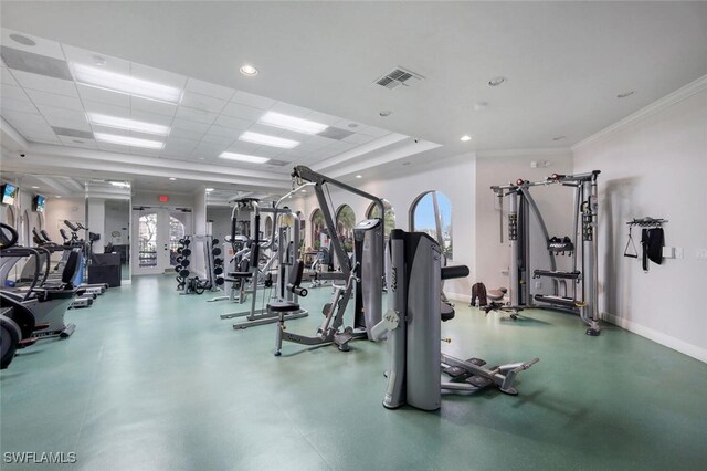 gym featuring crown molding, a paneled ceiling, recessed lighting, visible vents, and baseboards