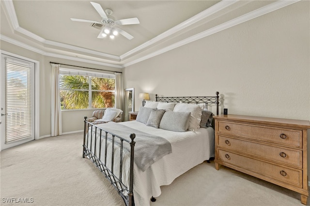 bedroom with light carpet, access to outside, a raised ceiling, and crown molding