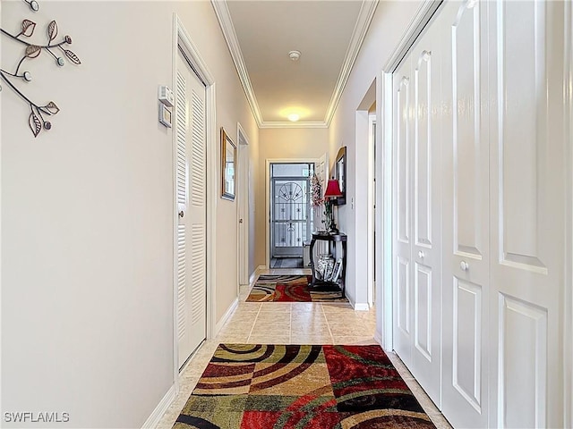 8096 Queen Palm Ln Unit 227, Fort Myers, FL 33966 - interior space with baseboards, light tile patterned flooring, and crown molding