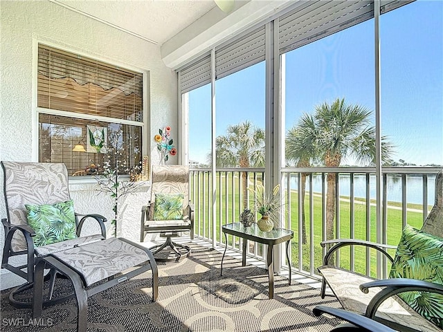 8096 Queen Palm Ln Unit 227, Fort Myers, FL 33966 - sunroom with a water view and plenty of natural light