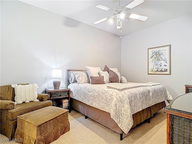 8096 Queen Palm Ln Unit 227, Fort Myers, FL 33966 - bedroom with light colored carpet and a ceiling fan