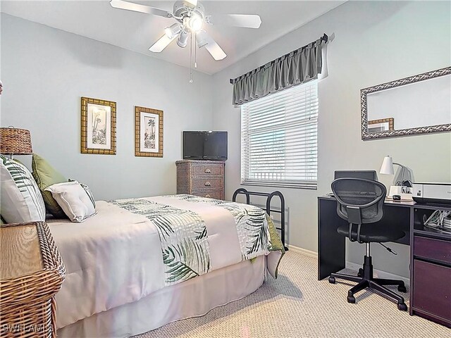 8096 Queen Palm Ln Unit 227, Fort Myers, FL 33966 - bedroom with ceiling fan, baseboards, and carpet floors