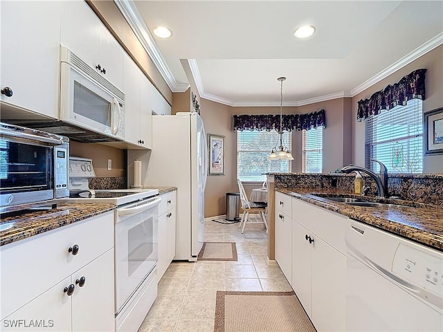 8096 Queen Palm Ln Unit 227, Fort Myers, FL 33966 - kitchen with white appliances, white cabinets, crown molding, and a sink