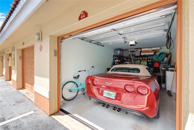 garage featuring a garage door opener