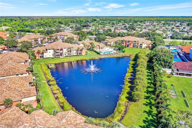 bird's eye view with a residential view and a water view