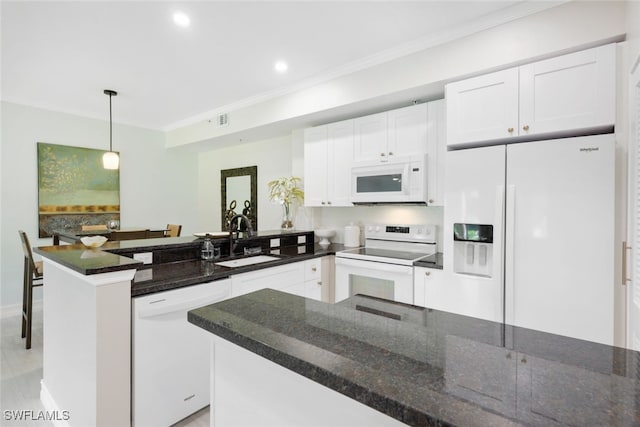 kitchen featuring ornamental molding, white cabinetry, a sink, white appliances, and a peninsula