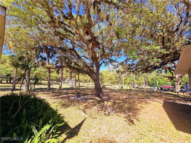 view of yard featuring fence