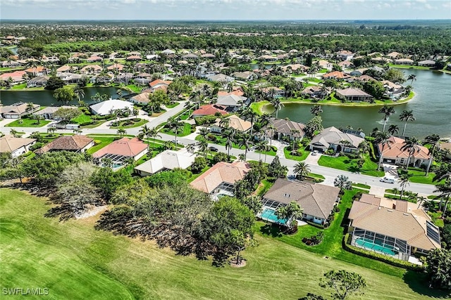 aerial view featuring a residential view and a water view