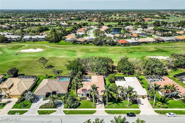 8880 Lely Island Cir, Naples, FL 34113 - drone / aerial view featuring golf course view and a residential view