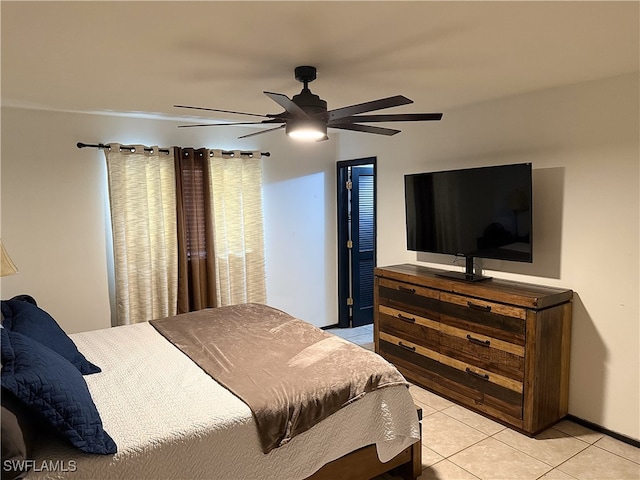 bedroom featuring ceiling fan and light tile patterned flooring