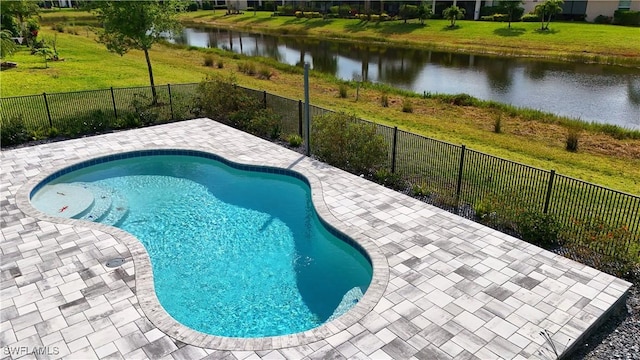 view of pool featuring a lawn, a patio, a fenced in pool, and a fenced backyard
