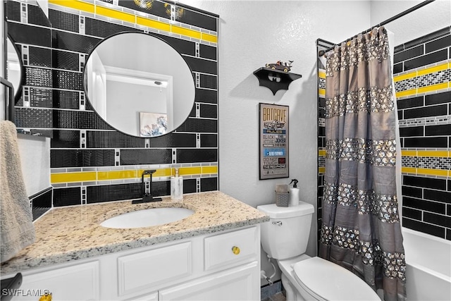full bathroom featuring decorative backsplash, vanity, toilet, a textured wall, and shower / bathtub combination with curtain