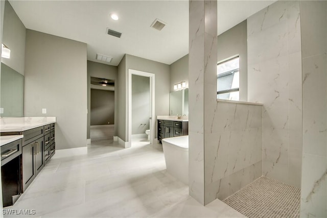 full bath with a bath, marble finish floor, vanity, and visible vents