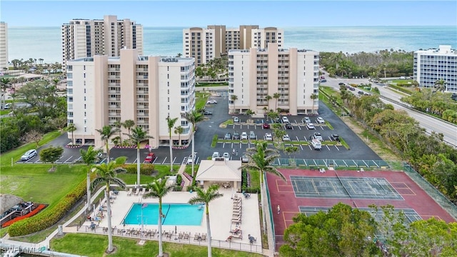 drone / aerial view with a water view and a city view