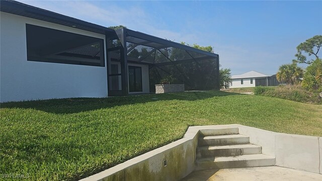 view of yard with a lanai