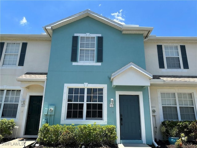 view of property featuring stucco siding