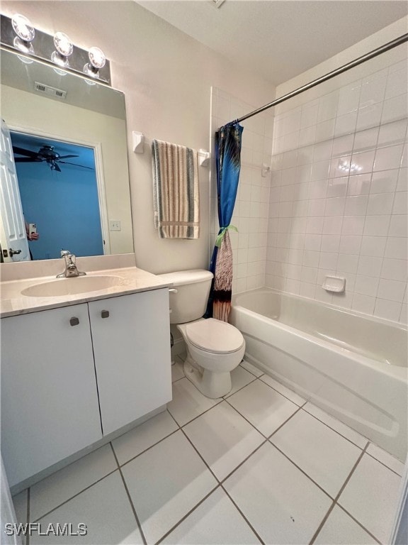 bathroom featuring shower / bathtub combination with curtain, visible vents, vanity, and tile patterned floors