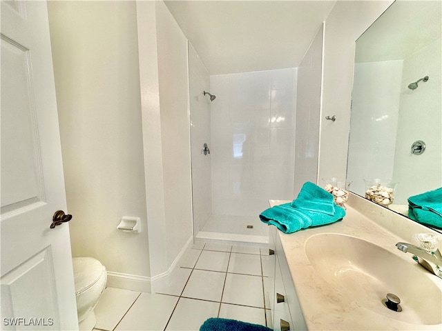 full bath featuring toilet, tile patterned flooring, a shower, and vanity