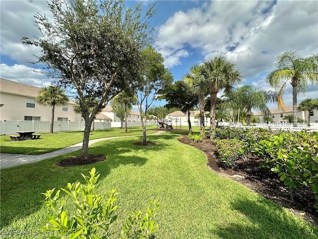 view of yard with a residential view and fence