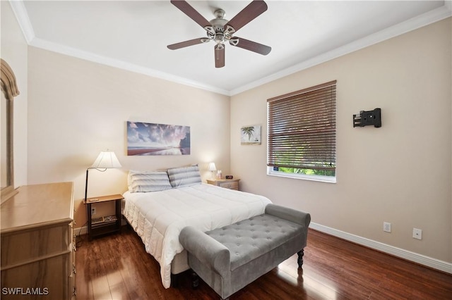 bedroom featuring dark wood-type flooring, baseboards, ornamental molding, and ceiling fan