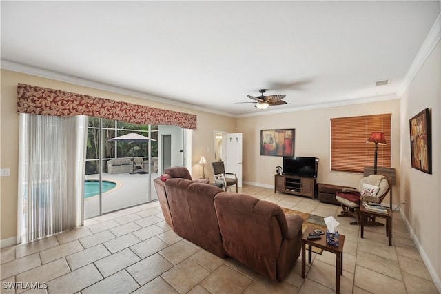 living area with crown molding, light tile patterned floors, a ceiling fan, and visible vents