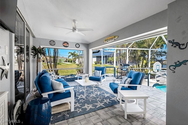 sunroom with a ceiling fan