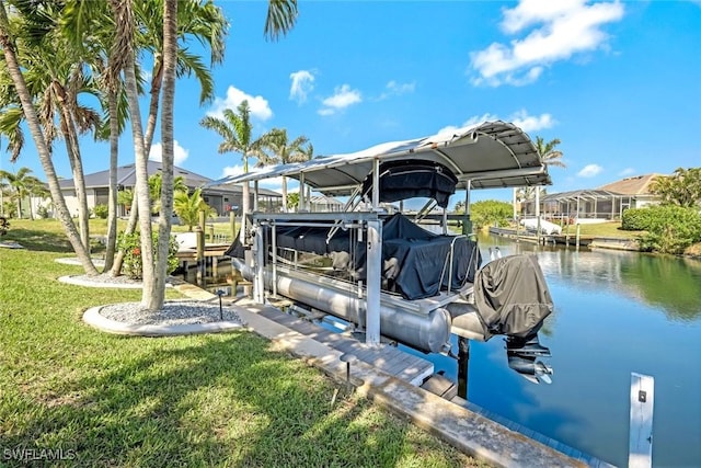 view of dock featuring a residential view, a water view, a lawn, and boat lift