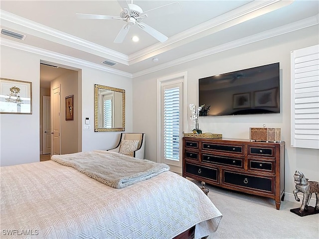 carpeted bedroom with a ceiling fan, recessed lighting, visible vents, and crown molding